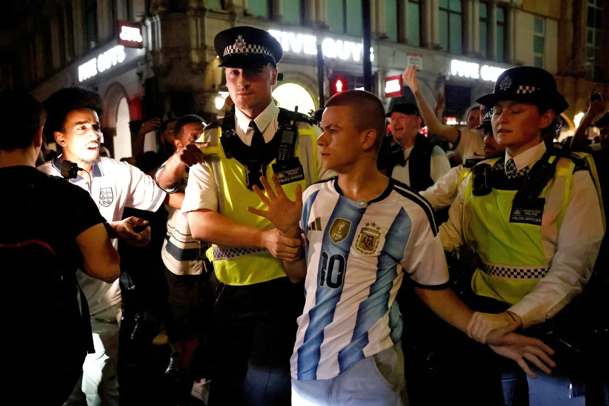 Argentina Fan Rescued by Police After Shirt Incident at England Match