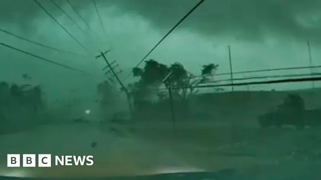 Dashcam Footage Shows Tornado Toppling Power Lines Onto Car in Wisconsin