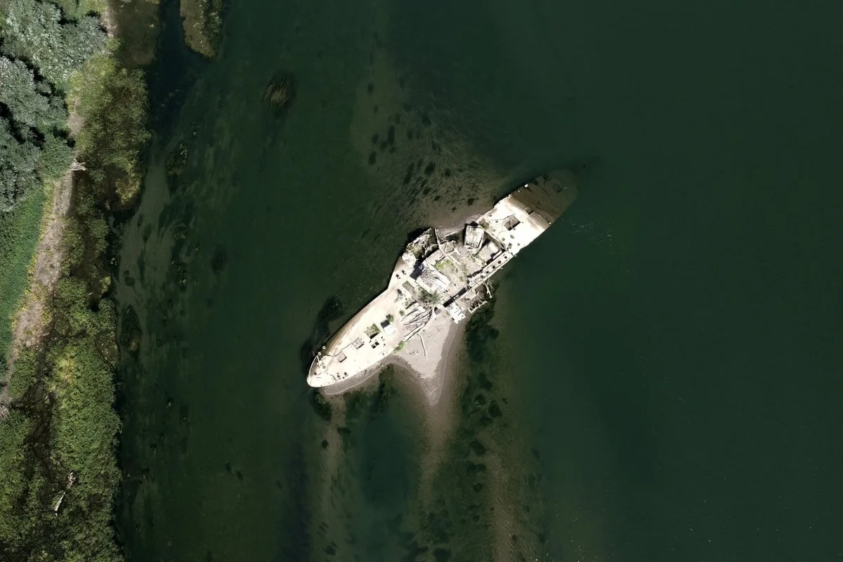 Drought in Europe Uncovers Sunken Steam Tugboat and Ancient Roman Bridge