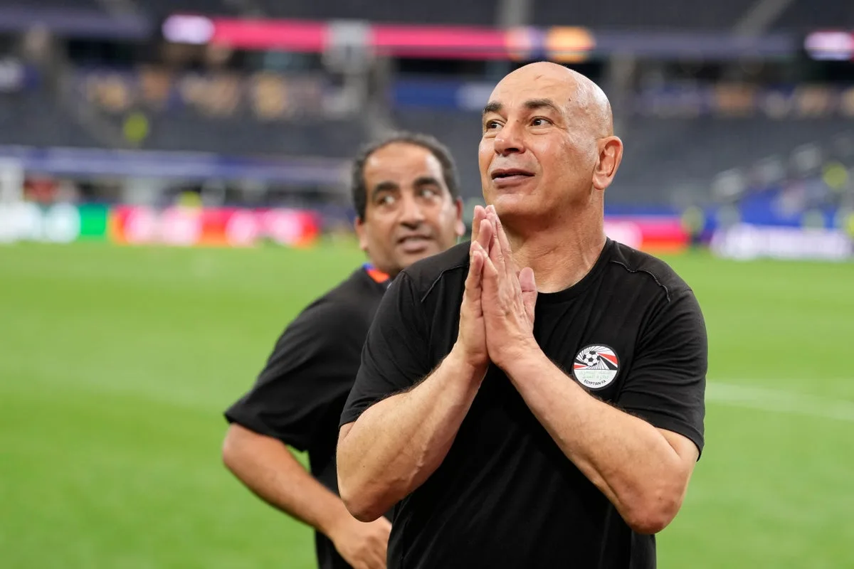 Egypt Coach Hossam Hassan Waves Palestinian Flag After World Cup Win Over Australia
