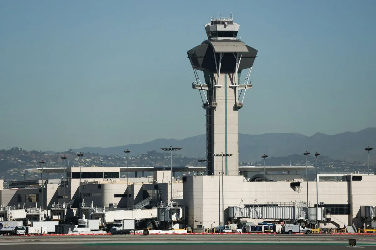 FAA Investigates Frontier Plane's Near Miss With Trucks at LAX Taxiway
