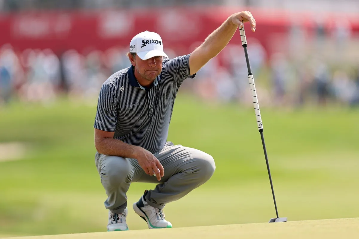 Lucas Glover Removes Shoes During 3M Open to Address Spike Mark Complaints