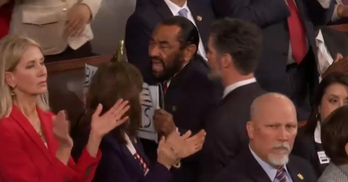 Rep. Al Green removed during Trump State of the Union holding protest sign