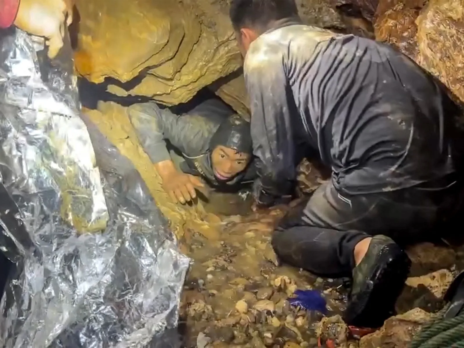 Rescuers Search for Two Trapped Miners in Flooded Laos Cave Amid Heavy Rains
