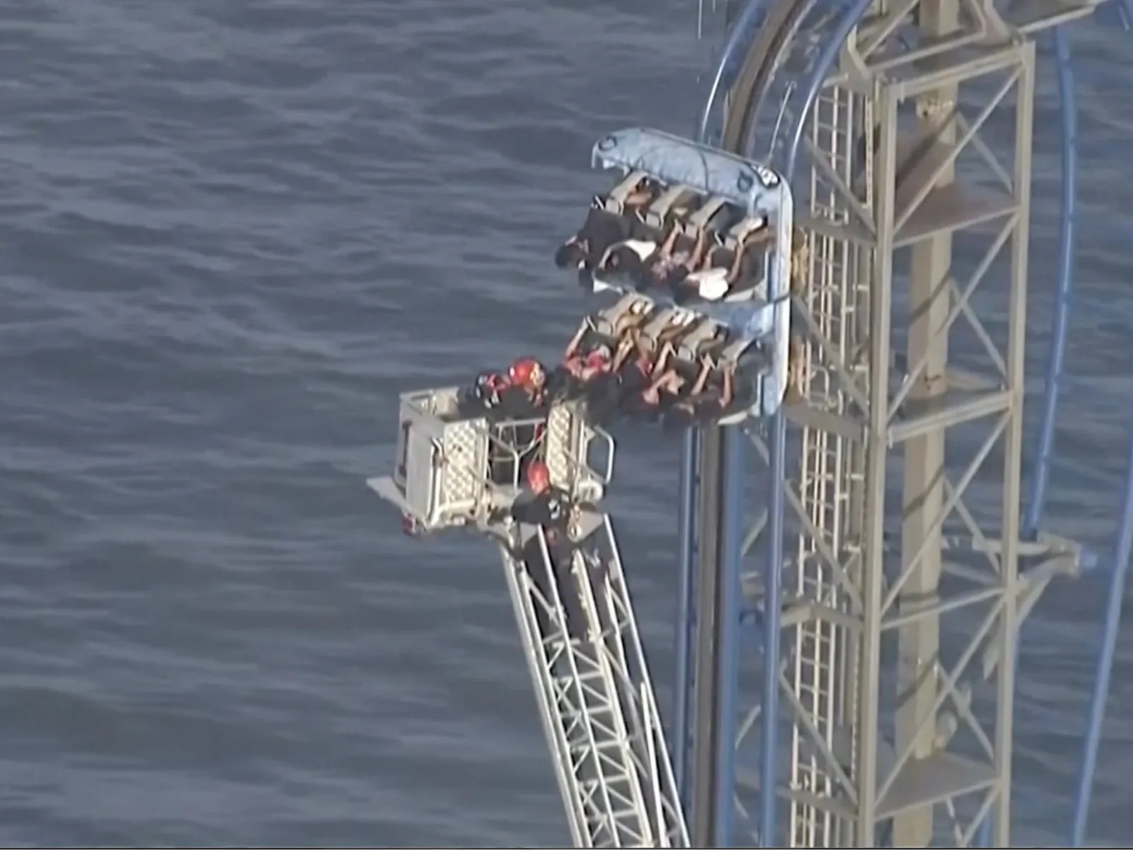 Riders Trapped on 100ft Texas Rollercoaster After Malfunction