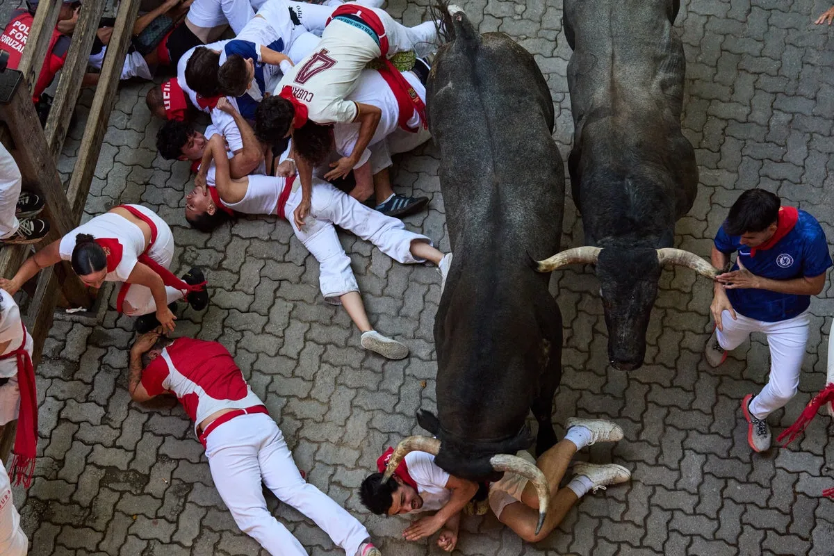 Runner Gored in Face During Chaotic San Fermin Bull Run in Spain
