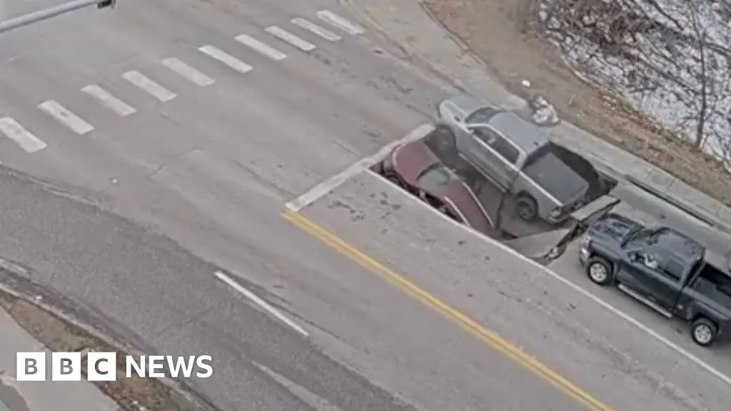 Sinkhole Opens at Omaha Intersection Swallowing Two Cars