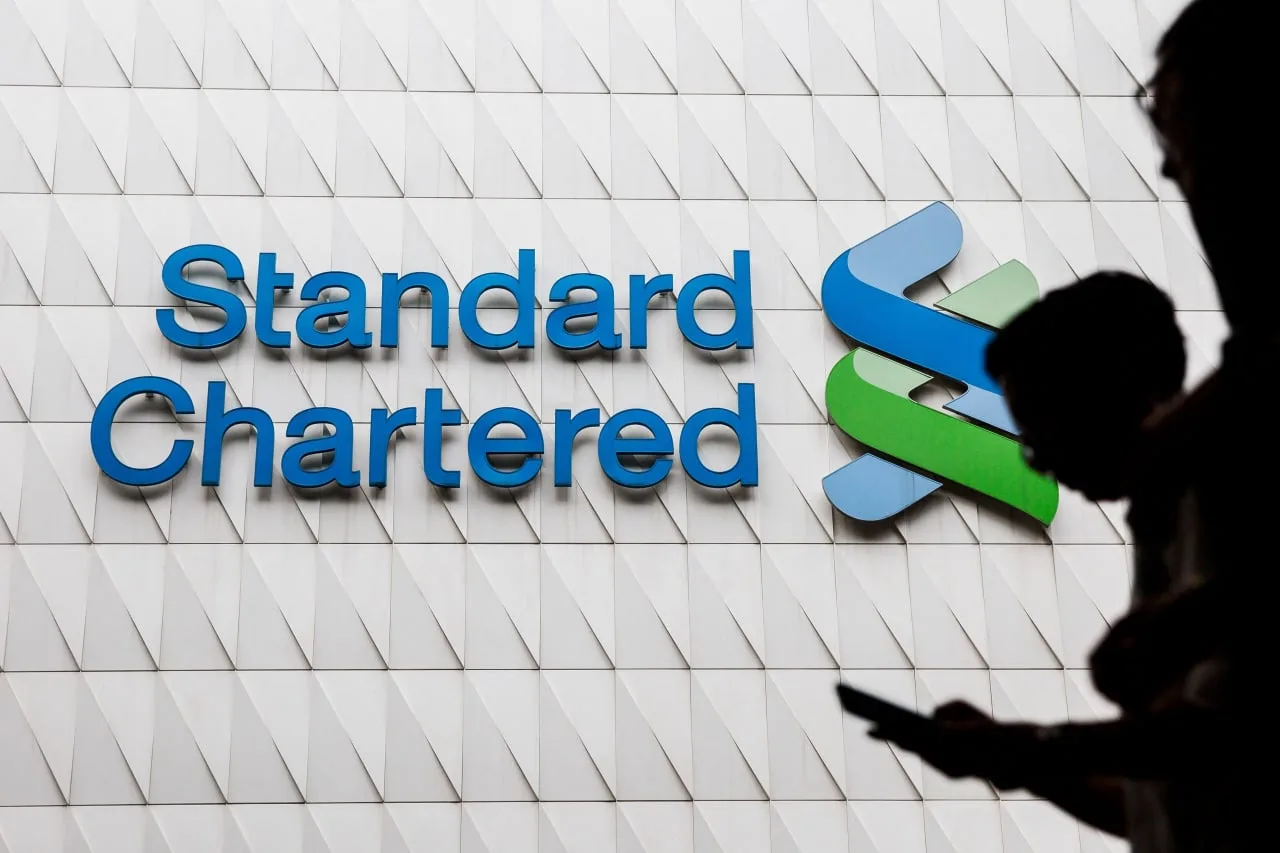 Standard Chartered and Meta Reorganize Workforce Amid Increased AI Adoption