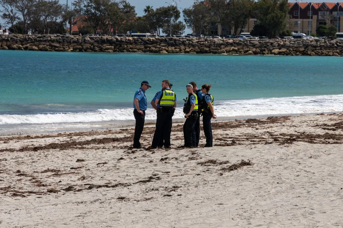Swimmer Killed in Shark Attack Off Perth, Prompting Beach Closures and Search Efforts