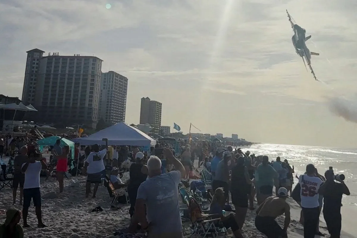 US Navy Blue Angels Jet Flies Low Over Crowded Pensacola Beach