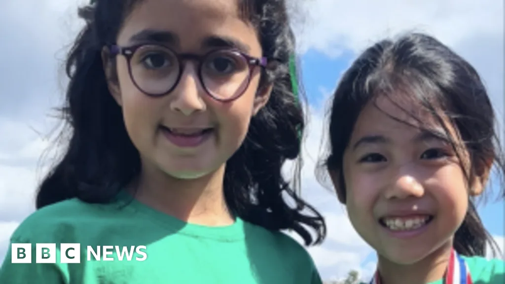 Woman Charged After Car Crash at London School Kills Two Girls