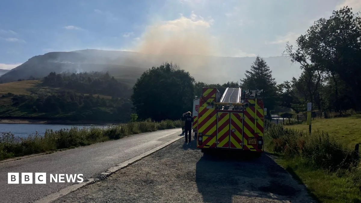 Woman Charged After Moorland Fire Near Dove Stone Reservoir Continues to Burn
