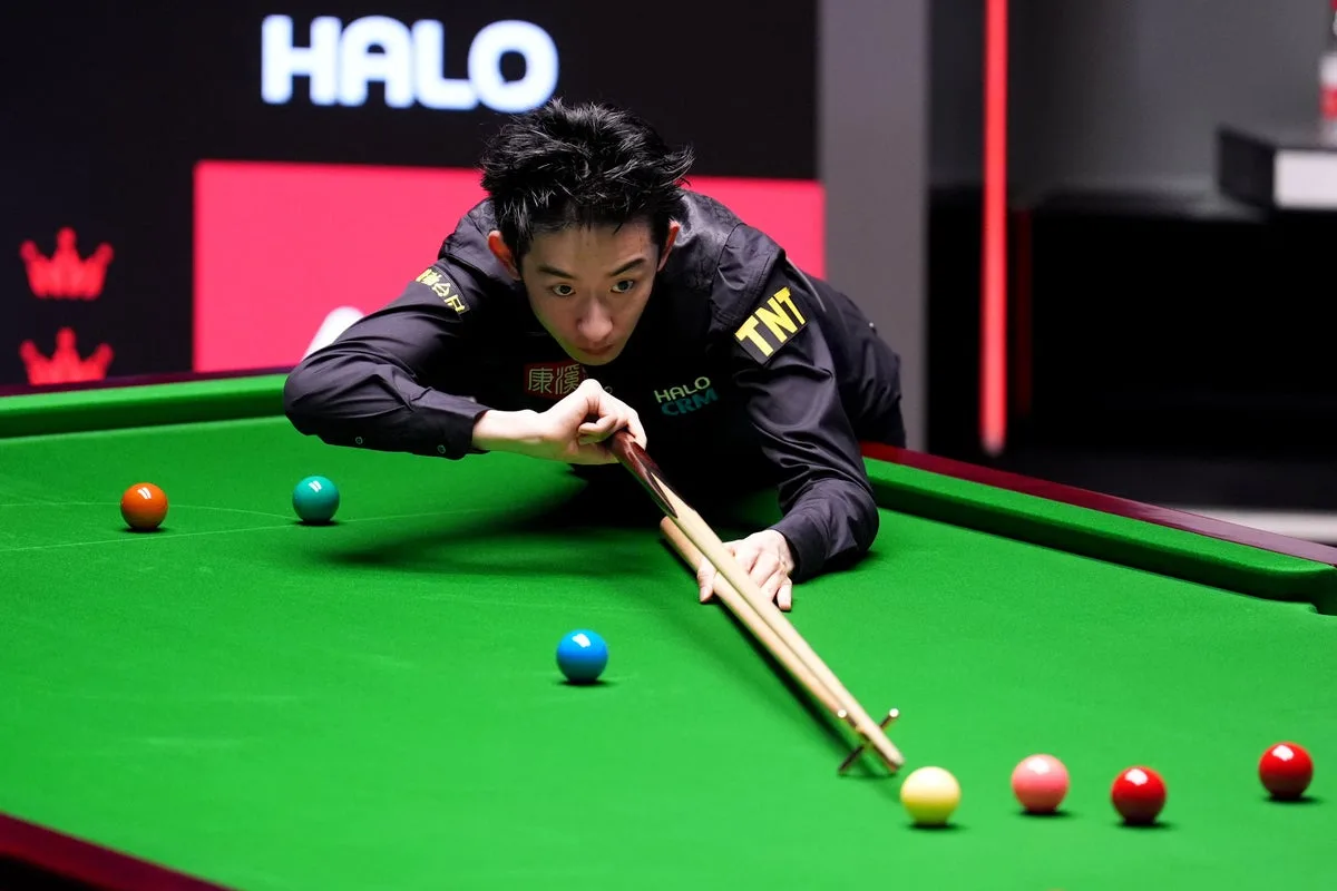 Wu Yize leads Shaun Murphy 13-12 in World Snooker Championship final